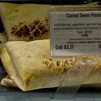 Curried Sweet Potato wrap. at The 8th Day in Manchester