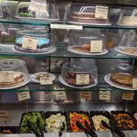 Café's vegan cakes and salads at The 8th Day in Manchester