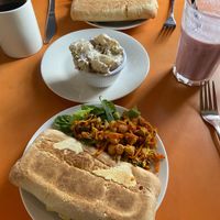 Vegan salami, cheese and pesto panini with chickpea relish and potato salad 💚 at The Egg Cafe in Liverpool