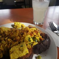 Vegan scrambled tofu breakfast toast with homemade lemonade at The Egg Cafe in Liverpool