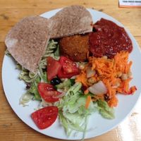 spicy bean burger with pita and salad at The Egg Cafe in Liverpool