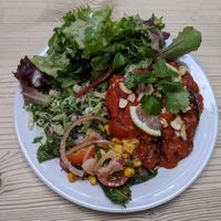 Imam Bayeldi (Middle Eastern Aubergine dish) with a range of interesting salads at Blue Moon Cafe in Sheffield