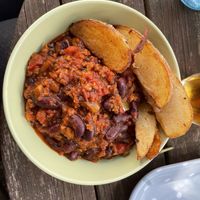 Vegan Chilli with wedges  at Cafe Paradiso in Chichester
