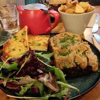 Shiitake mushroom lasagne, potato wedges and fennel tea. at Herbies in Exeter
