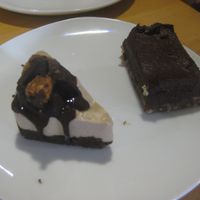 Raw peanut butter and chocolate cheesecake and chocolate avocado mousse (both vegan) at Archie Browns Health Food in Penzance