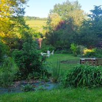 Garden overlooking the hills at La Maison du Vert in Ticheville
