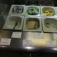 vegan breakfast options are visibly marked at Osho's Place in Cologne