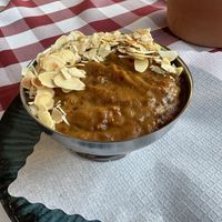 Warm apricot compote with almond flakes    at Tassajara in Hamburg