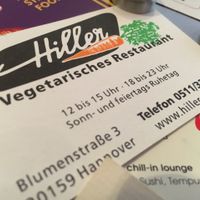 Business card with opening times at Hiller in Hannover