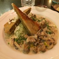 Mushrooms in a cream sauce with crispy housemade seitan and risotto with bears' garlic. So good! at Hiller in Hannover