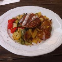 sesame patty with roasted potatoes and roasted veg at Hiller in Hannover