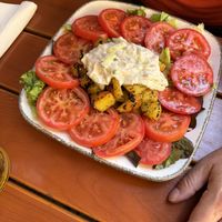 Baked potatoes, tzatziki, tomato salad   at Ignaz in Munich