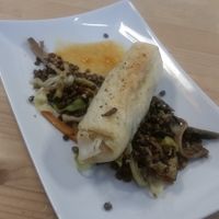 Lentil veggies with a Vegetable Roll.  at CafeBistro Mundial in Hagen