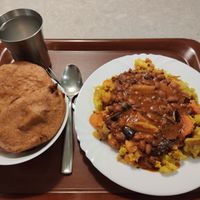 Lemonade with vegan Indian bread and food at Govinda I in Budapest