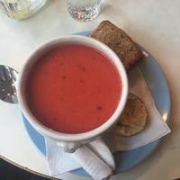 Beetroot and coconut milk soup with bread and hummus  at Kaffihusid Gardurinn - Ecstasy's Heart-Garden in Reykjavik