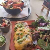 Enchilada with vegetables on the top. at Quay Co-op Cafe - Sullivan's Quay in Cork