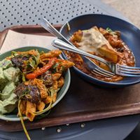Delicious potato salad and penne salad on the left, polenta with cheese sauce and ragu on the right at Cornucopia in Dublin
