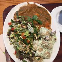 Curry with rice and two salads at Cornucopia in Dublin