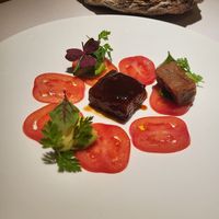 Tomato carpaccio, agedashi eggplant, marinated avocado, house made lentil tempeh at Joia Alta Cucina Naturale in Milan