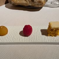 Petite dessert: pineapple marinated apple, hazelnut mousse filled raspberry, and carrot cake at Joia Alta Cucina Naturale in Milan