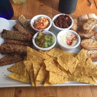 Nachos & toast with four sauces at Jardin Urbano in Valencia
