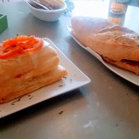 Cheese and tomato puff pastry and pulled pork bocadillo.  at Jardin Urbano in Valencia