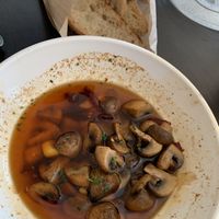Ajillo mushrooms with sourdough baguette at South Restaurant + Coffeehouse in Anchorage