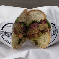 Weekend special - Vegan Turky Pesto Sub: Sunflower seed pesto, sliced tomatoes, vegan turky slices, pickled red onion, wild rocket, sub roll at FacePlant Foods in Edinburgh