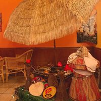Interior decorated with ethnic art and furnishings at Nanyea Restaurant Coffee House & Bar in Dayton