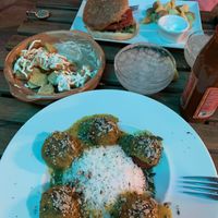 Patatas bravas y vegan meatballs with curry at Anchoita del Pana in Malaga