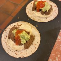 Tacos de falafel con guacamole y hummus  at Voodoo Restaurant in Badajoz