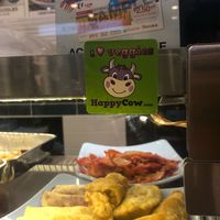 Happy cow sticker  at Eight Immortals Vegetarian 八仙素食园 - Choa Chu Kang in West Singapore