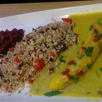 Banana curry 77kn (~10€50)
Grilled banana surrounded with a delicious curry sauce. Served with Brown rice and cranberry chutney. Vegan. Gluten free.  at Nishta in Dubrovnik