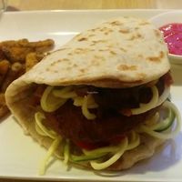 Bar-Bea Burger 83 Kn (~11€)
Barley-bean-smoked seitan burger. Naan bread to help keeping your fingers clean. Sweet potato sticks. Topped with onion BBQ and homemade senf sauce. Vegan.  at Nishta in Dubrovnik