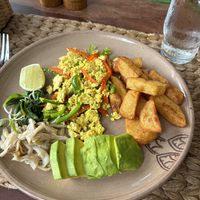 Tofu scramble and avocado, with gluten-free substitutes.  at New Leaf Eatery in Siem Reap