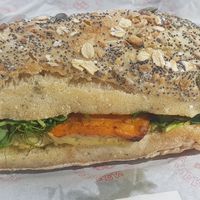 Cumin roast carrot, lemon and parsley, hummus, peashoots sandwich at Baltzersens in Harrogate