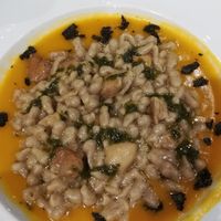 Spatzle di funghi porcini su vellutata di zucca at Farina & Co in Bergamo