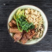 Plant Protein Powerhouse Brekkie (Paleo) - Turmeric & miso scrambled tofu, barbeque tempeh ‘bacon’, thyme-roasted mushrooms, sautéed spinach, sliced avocado and crispy pumpkin & sweet potato hash-browns at Matcha Cafe in Tibubeneng