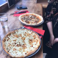 A vegan and non vegan pizza at Happiz - Sablons in Paris