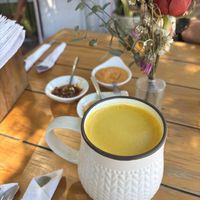 Golden latte with coconut mylk  at Nomada Organics & Gourmet in La Paz