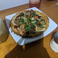 Tasty but tiny pizza. at Naturalia Cafe in Medellin