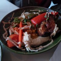 Special plate with roasted peppers at Akko Hummus Bar in Leipzig