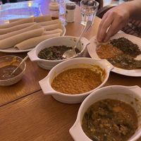 Two lentil dishes, okra and injera  at Keren View in North London