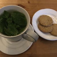 Fresh mint tea with oat & chia, and ginger cookies.  at Keren View in North London