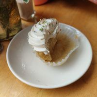 Half eaten vegan cupcake at Blue Scorcher Bakery Cafe in Astoria
