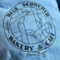 Tee shirts to support local cool business $18-25   at Blue Scorcher Bakery Cafe in Astoria