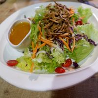 Salad With Orange Ginger Sauce. at Vegan Delights Cafe in Ipoh
