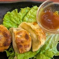 Grilled dumplings with a barbecue style sauce. Very tasty. They come with 4. I ate one. at Bodhi Vegan in Paris