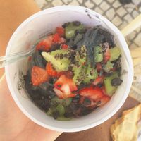 The Vegan yoghurt option with charcoal. With strawberries, kiwis and cookie crumbs.  at Myiced Baixa in Lisbon