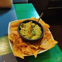 Guacamole con nachos caseros at La Doña Gastronomia Mexicana in Gijon